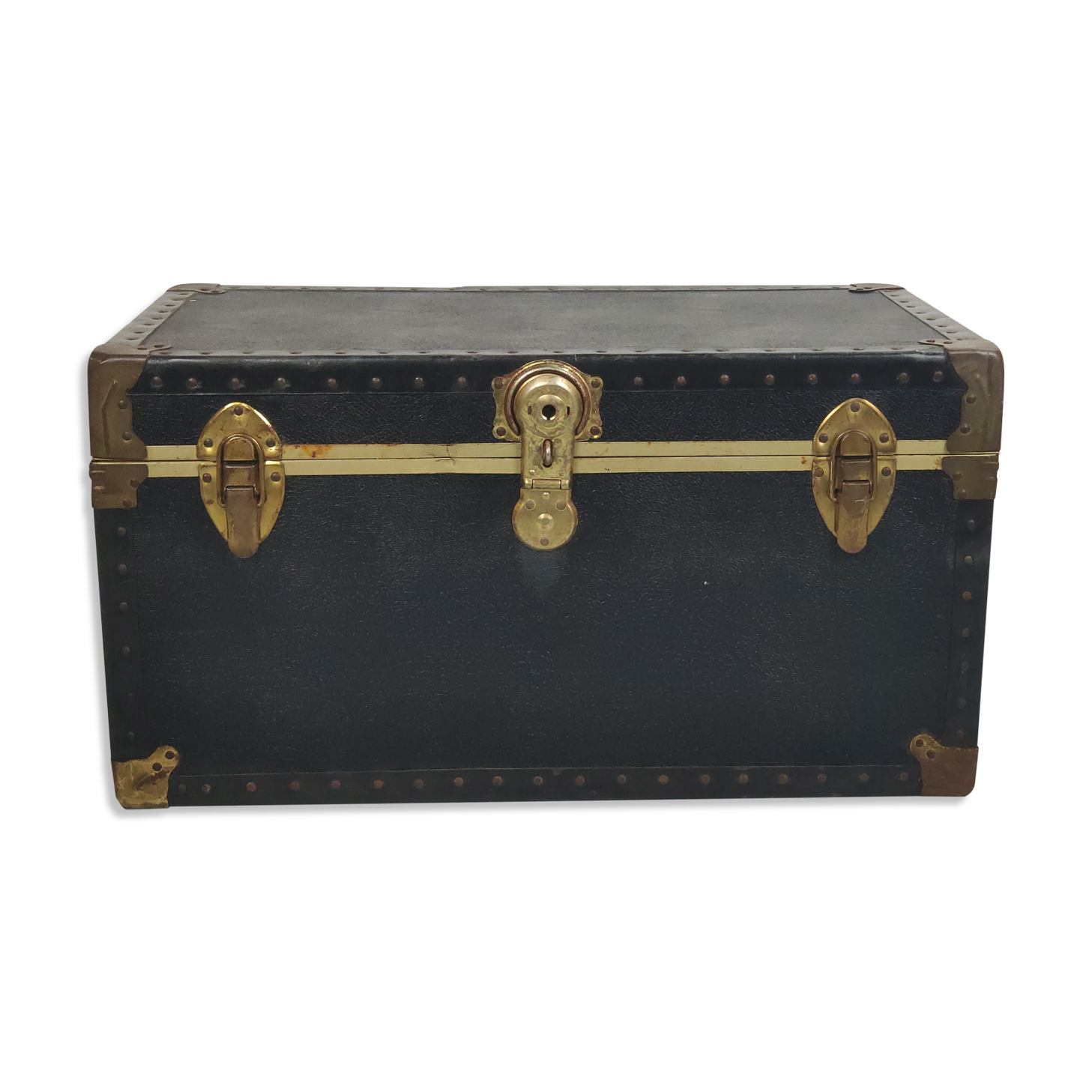 Old black trunk and brass