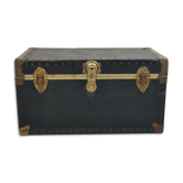 Old black trunk and brass