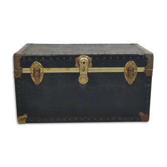 Old black trunk and brass