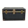 Old black trunk and brass