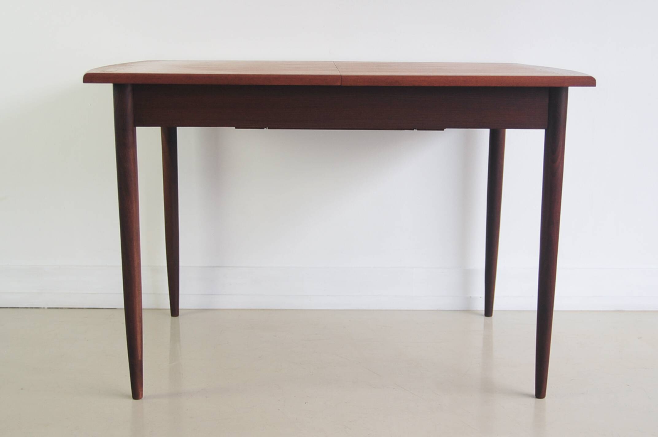 Folding teak dining table