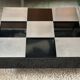 Table basse laque noire et acier brossé 1970