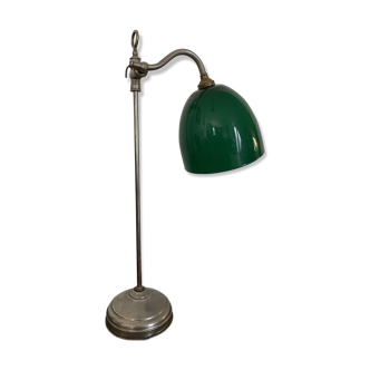 Old desk with green opaline lamp