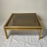 Table basse en verre et laiton