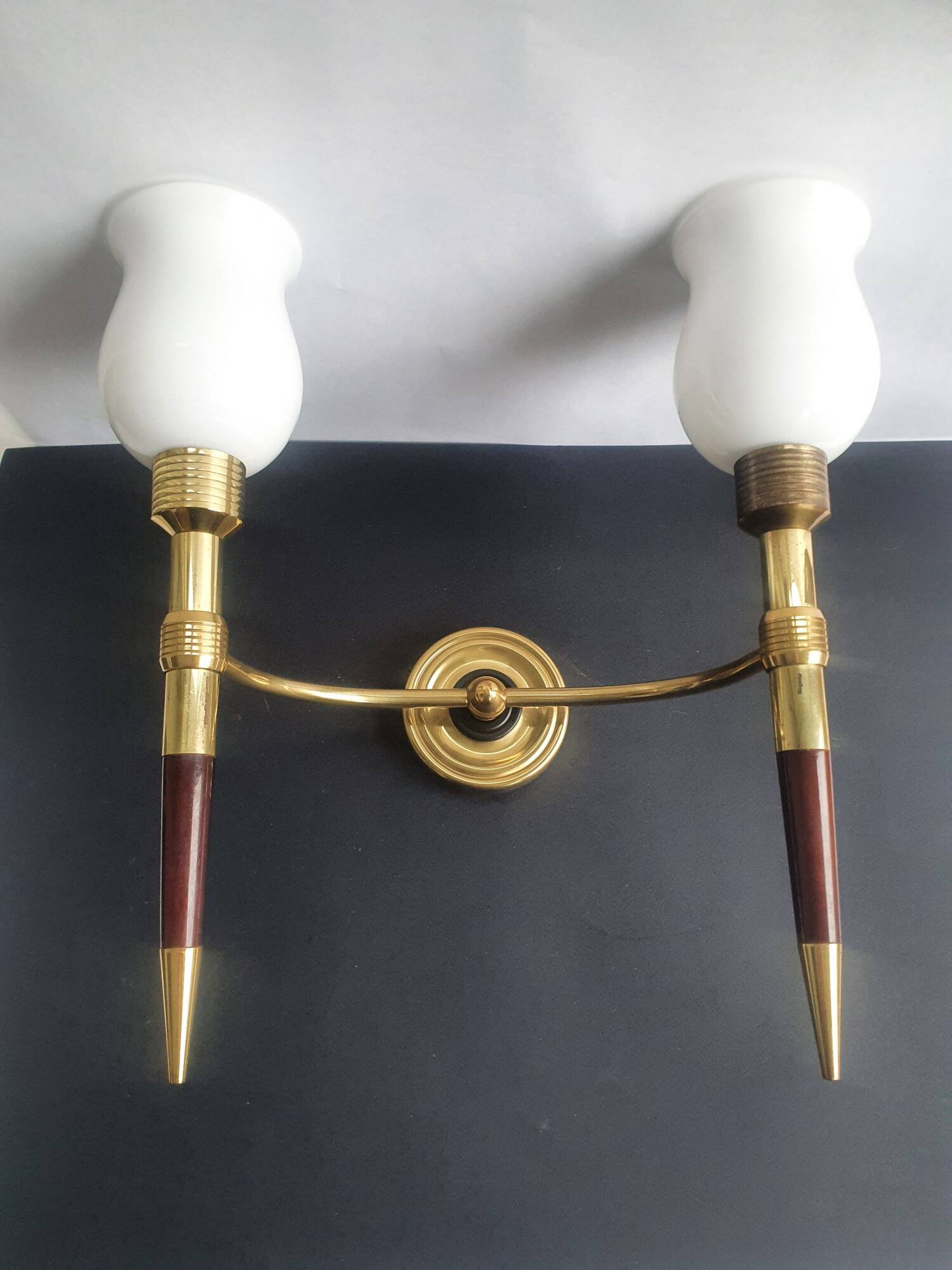 Pair of large torch-style wall sconces from the 1950s