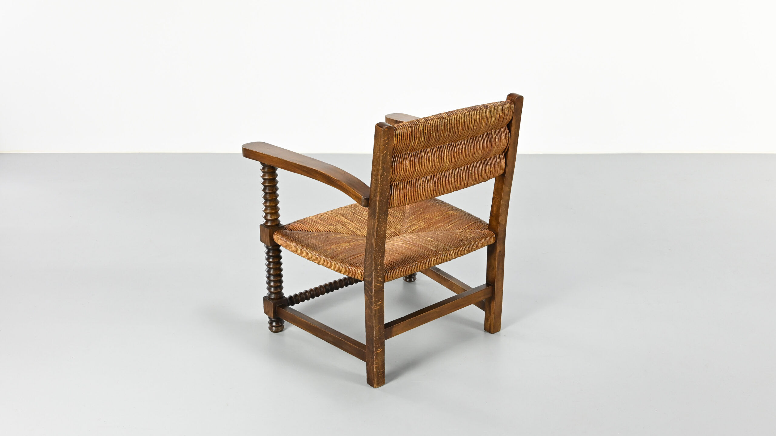 Pair of French armchairs with twisted legs in the style of Charles Dudouyt, France, 1940s.