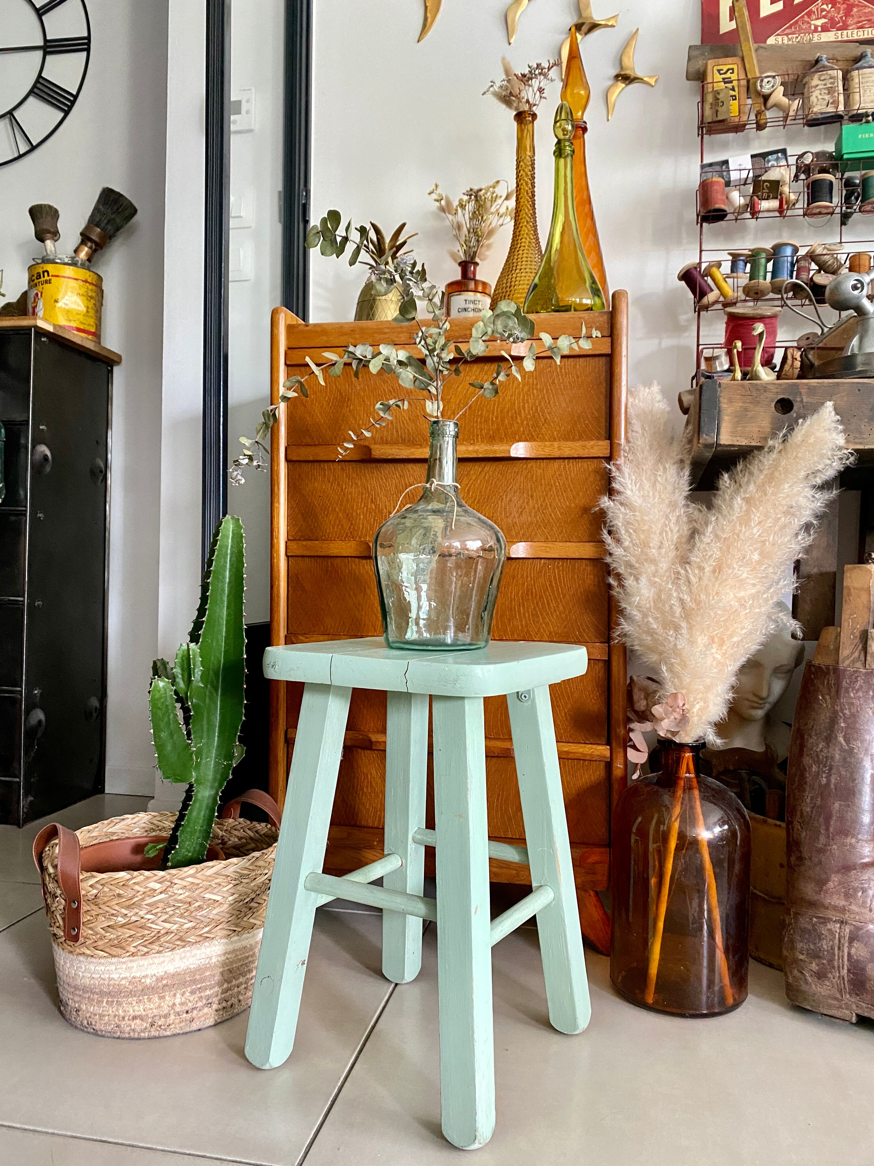Old almond green wooden stool