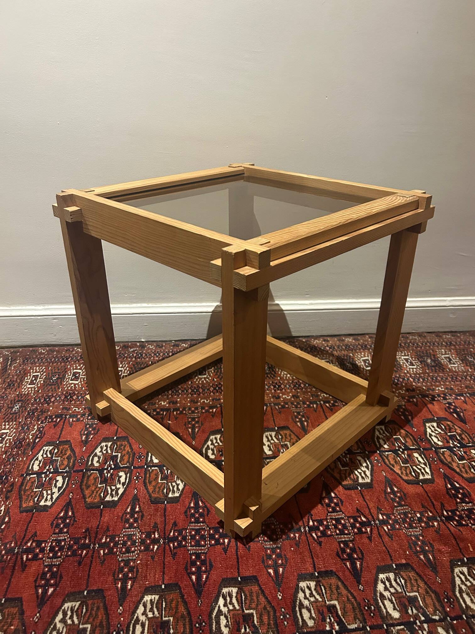 Brutalist table in wood and smoked glass
