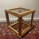 Table brutaliste en bois et verre fumé