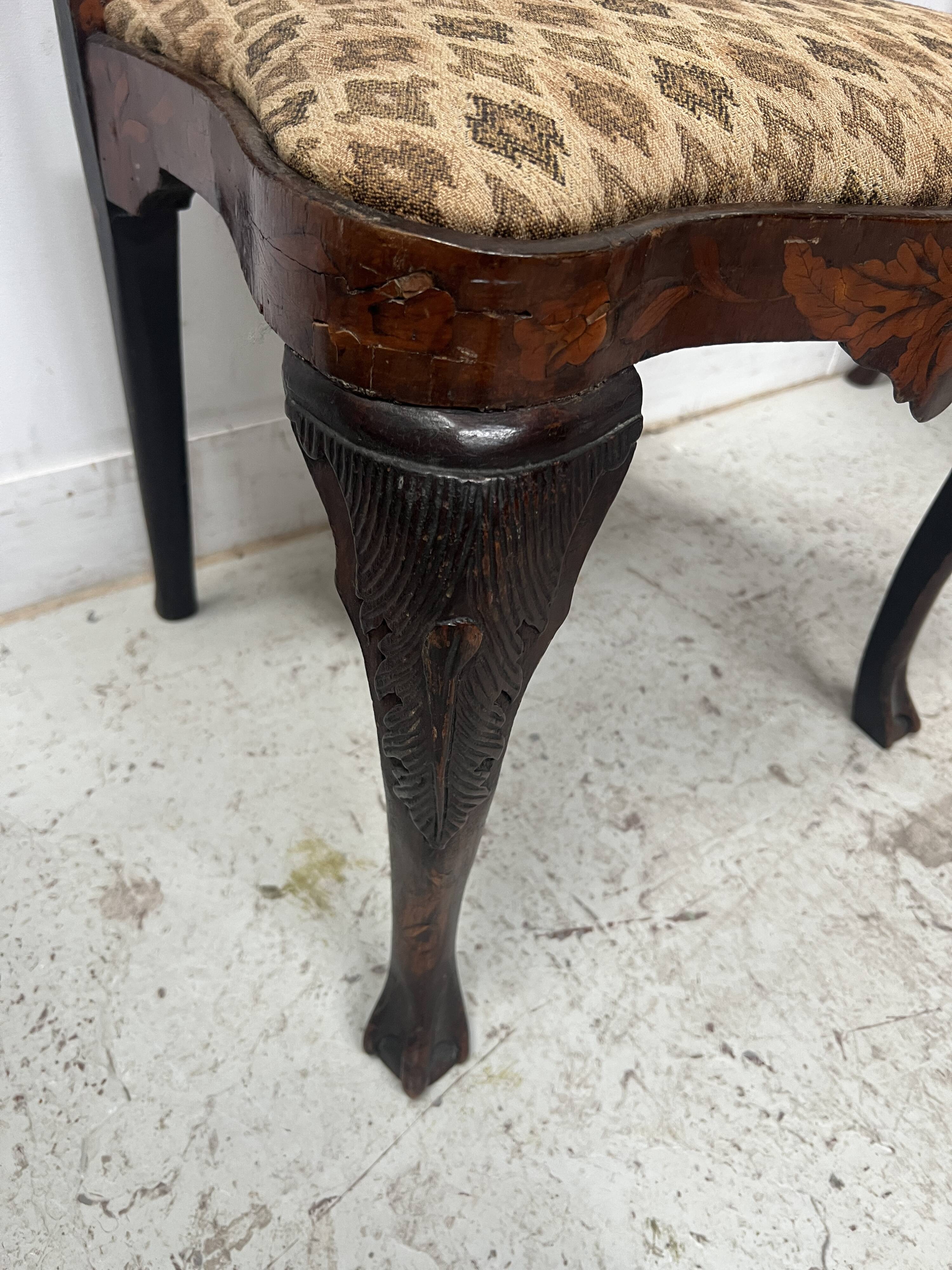 Set of eight Dutch marquetry chairs from the 19th century.