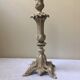 Large candle holder in patinated white painted metal