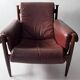 Fauteuil Amiral d'Eric Merthen, en cuir et palissandre
