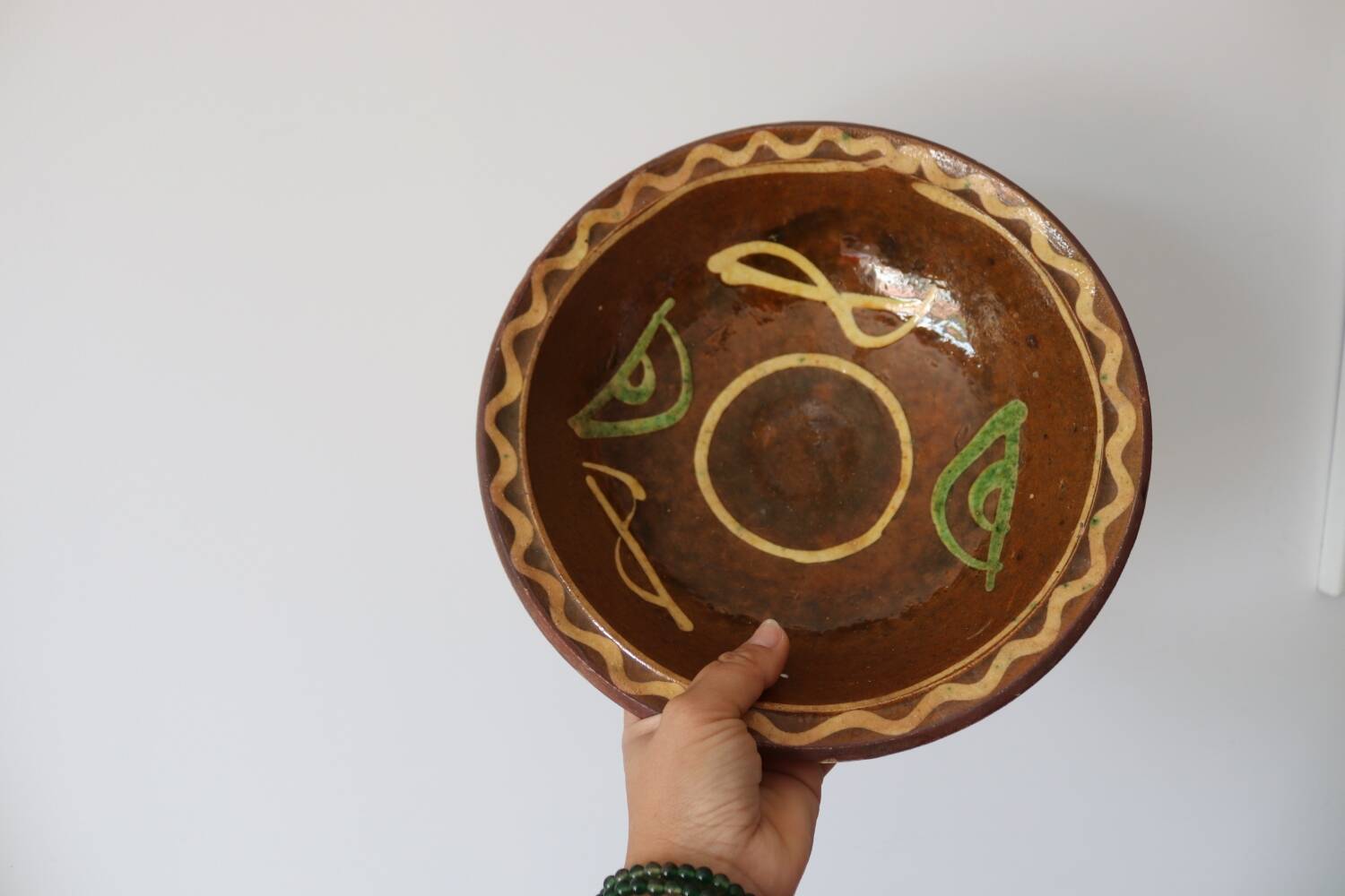 Saladier en terre cuite vernissée ancien