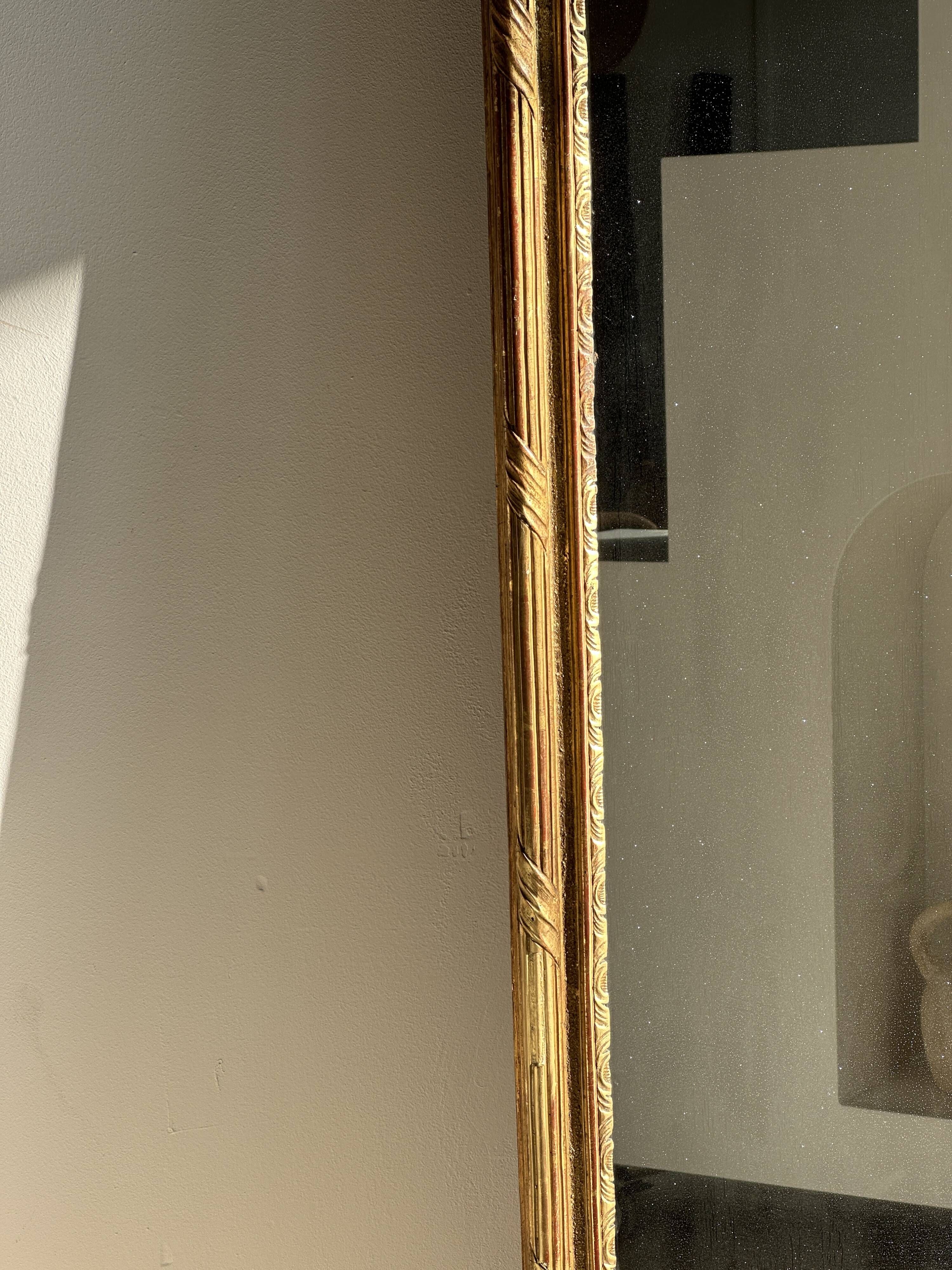Large gilded mirror 19th century rounded corners mercury glass Louis XVI style