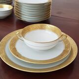Porcelain plates and bowls of Limoges gold decoration