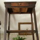 Old country side table in waxed wood