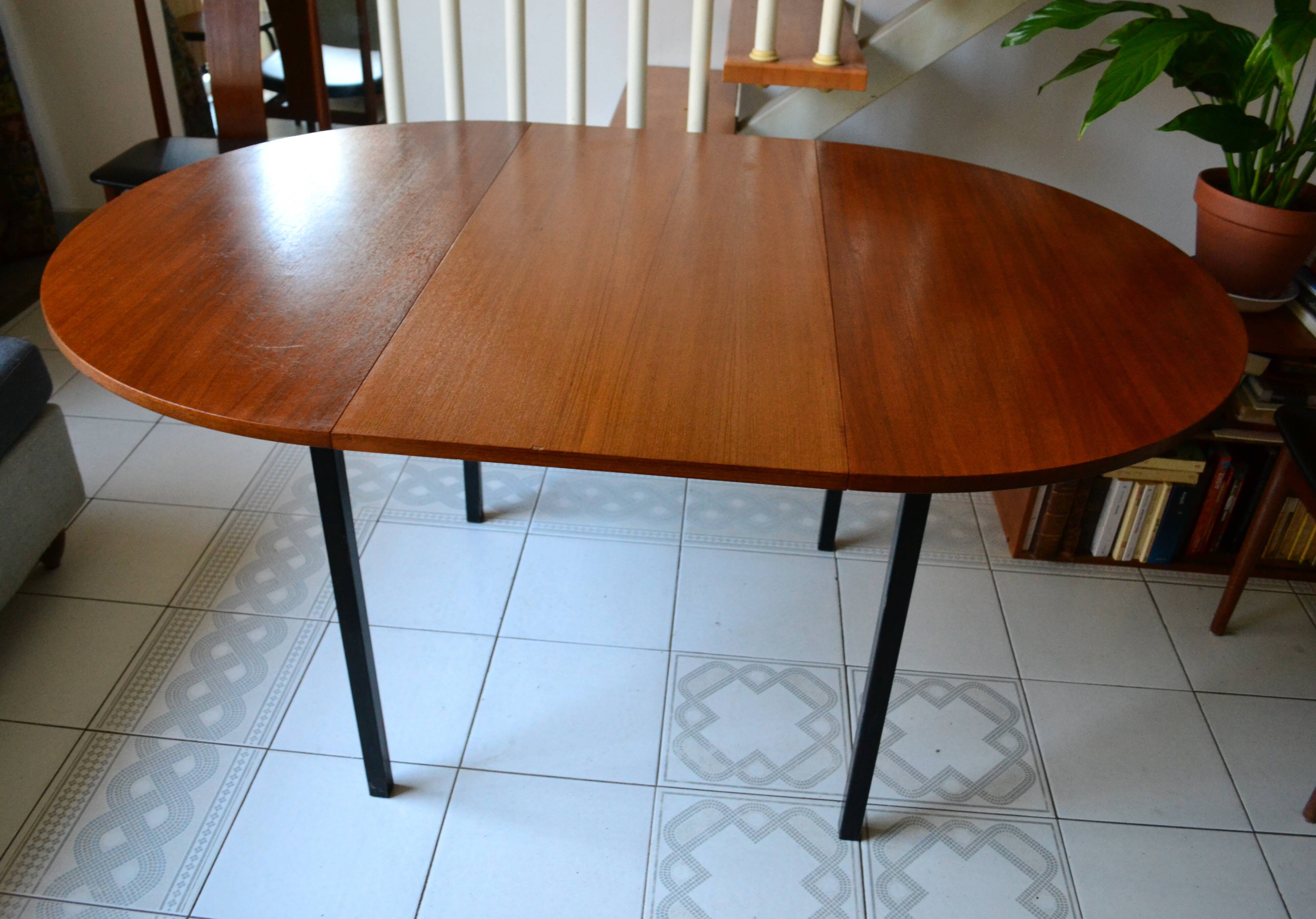 Dining table Pierre Guariche, teak and black steel from the 1960s with extension.