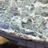 Low marble and black metal table