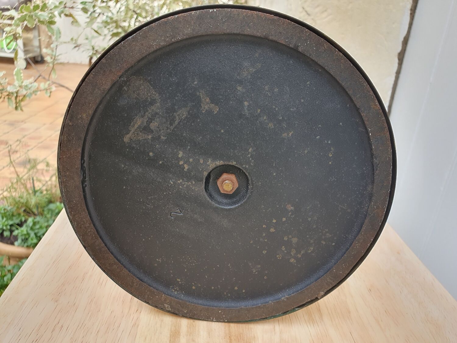 Perforated metal umbrella stand and scoubidou