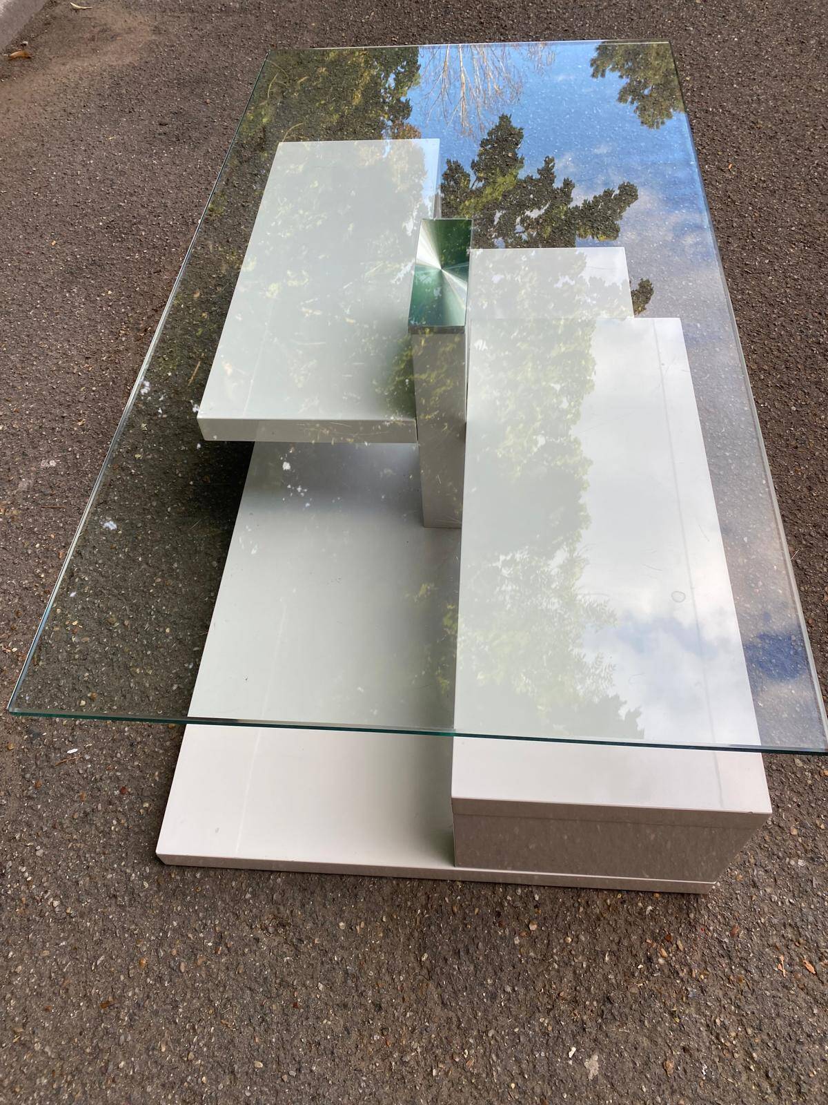 Glass and white lacquered coffee table