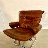 Vintage mid-century Scandinavian cognac leather lounge chair by Harald Relling