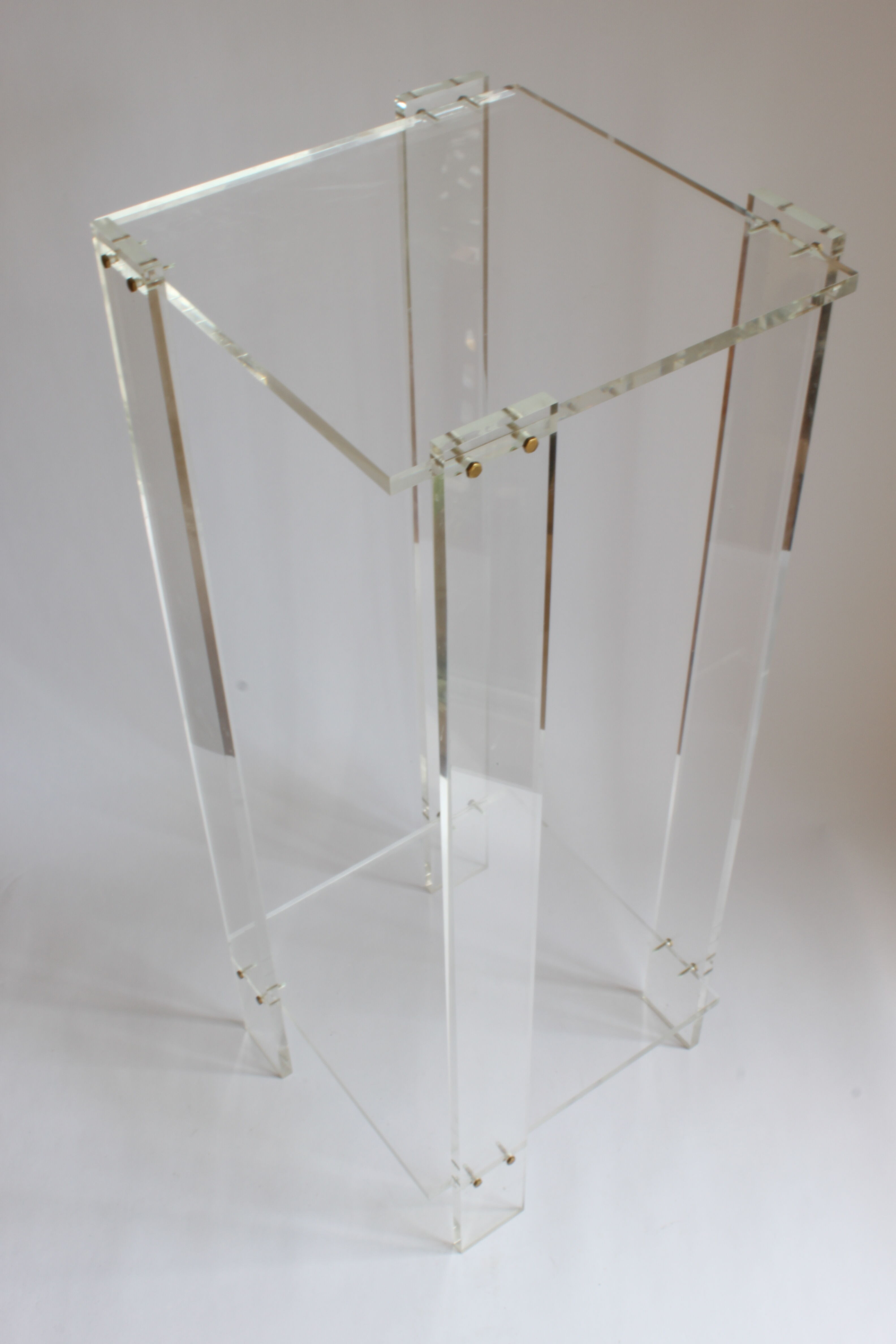 Tall lucite sidetable, 1970s.