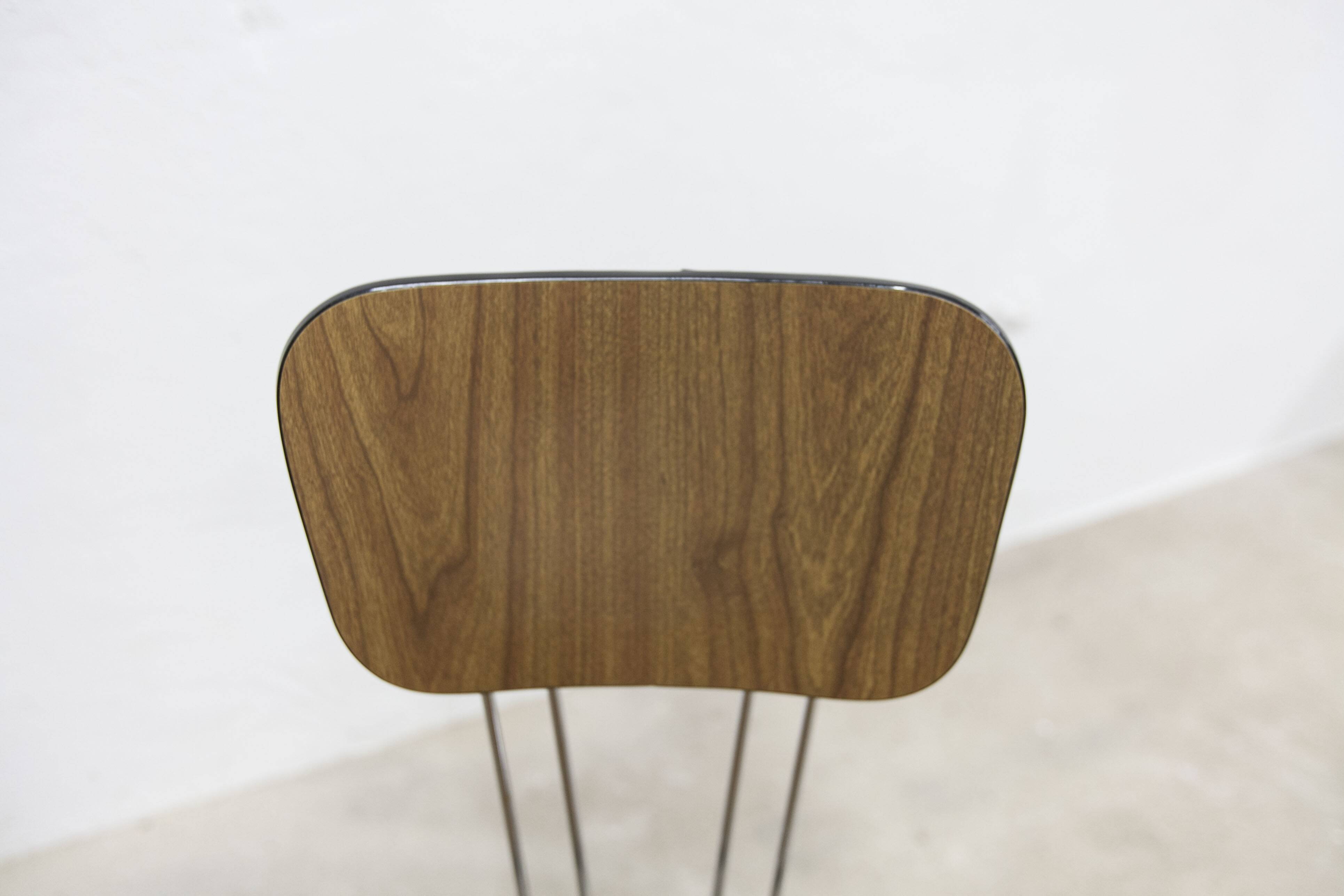 Pair of Formica 1970 brown Eiffel feet chairs