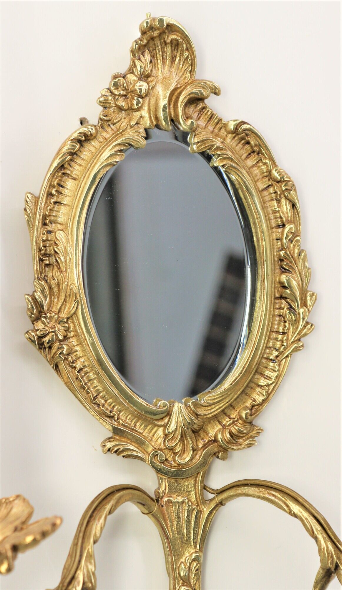 Pair of louis XV beveled mirror wall lamps in bronze by "Lucien Gau"