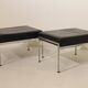 Pair of designer leather and brushed stainless steel footrests - Rob Parry