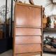 Vintage wooden secretary desk from the 50s