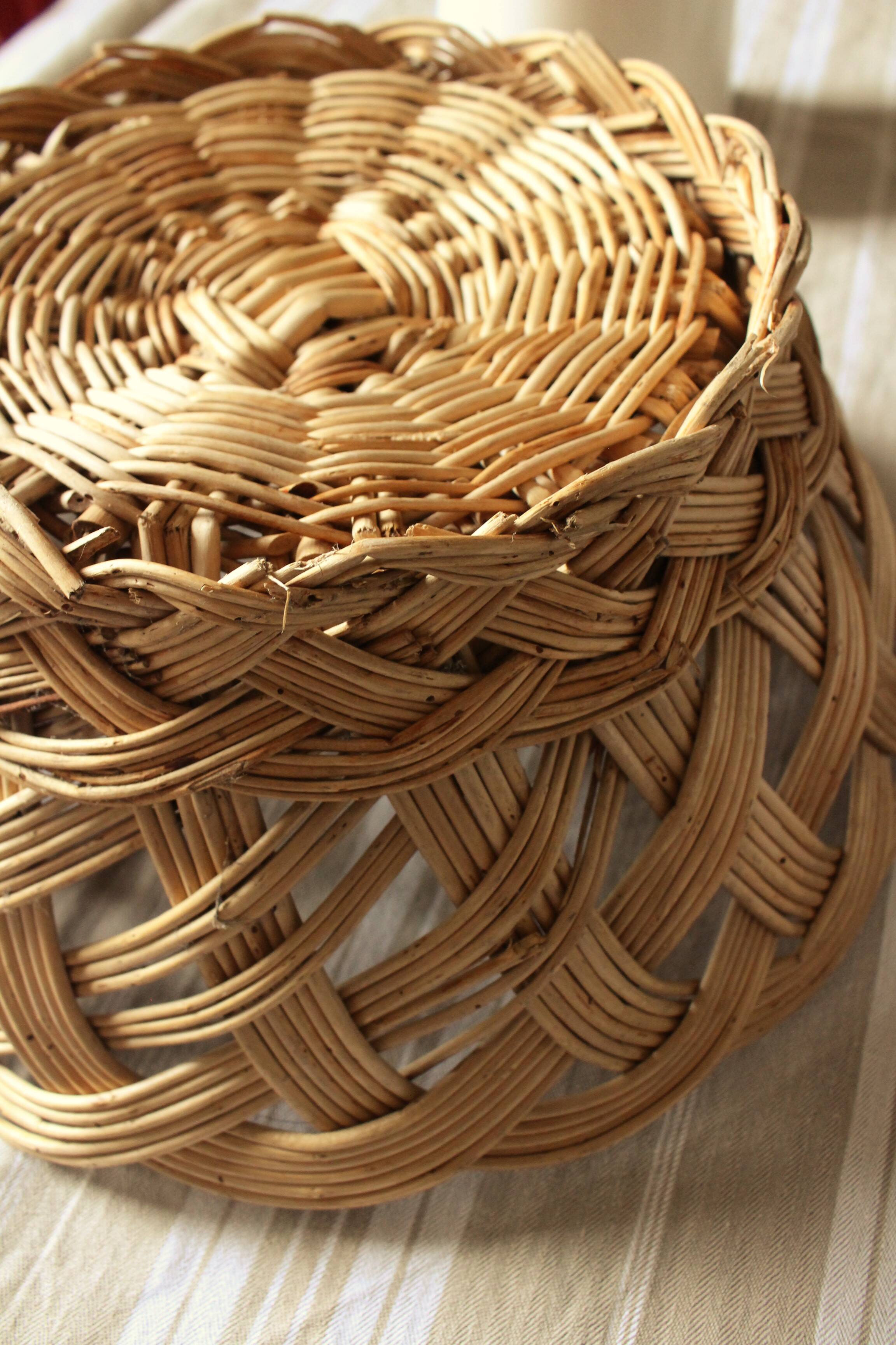 Vintage round wicker basket on stand