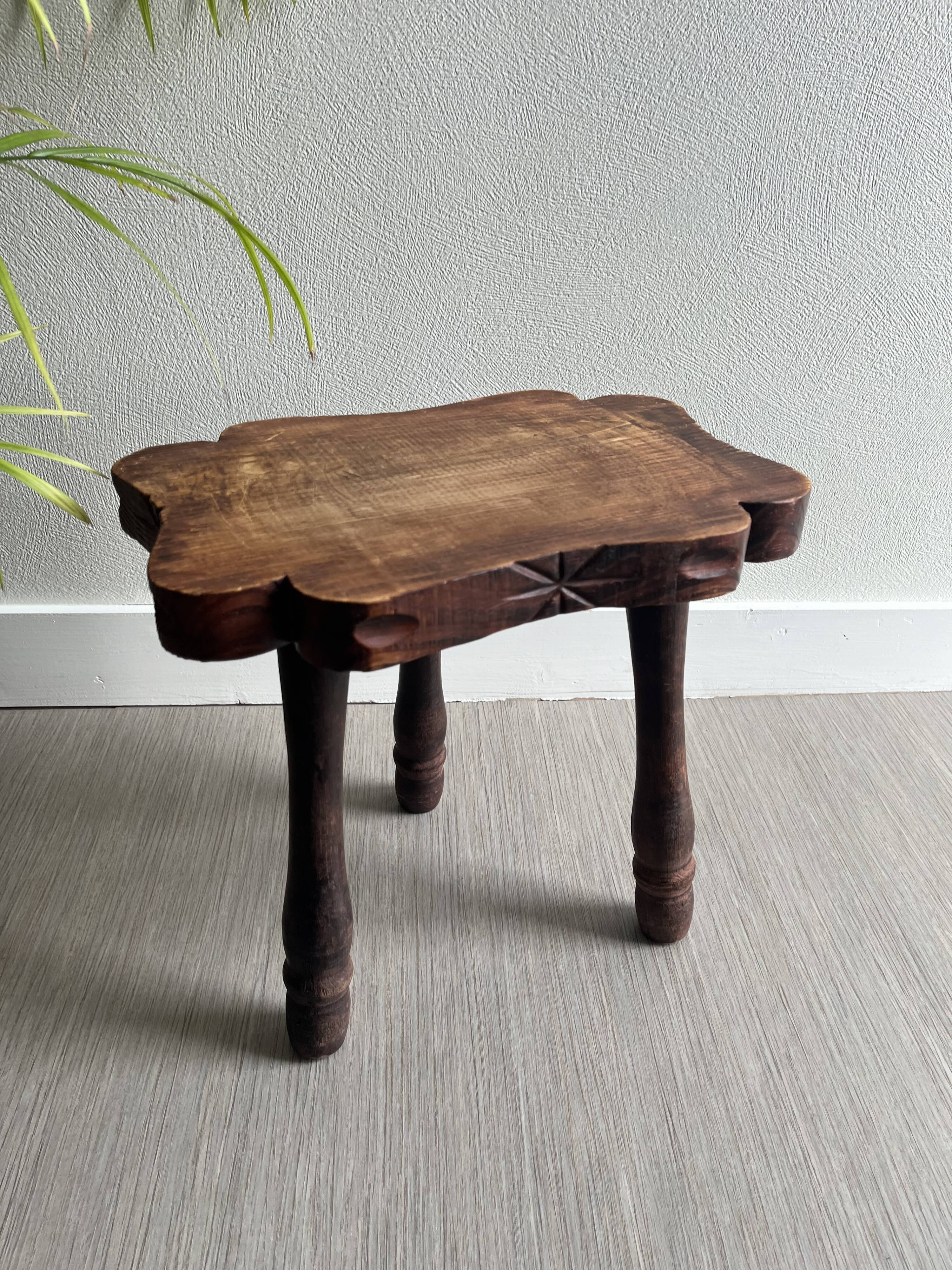 Wooden tripod stool