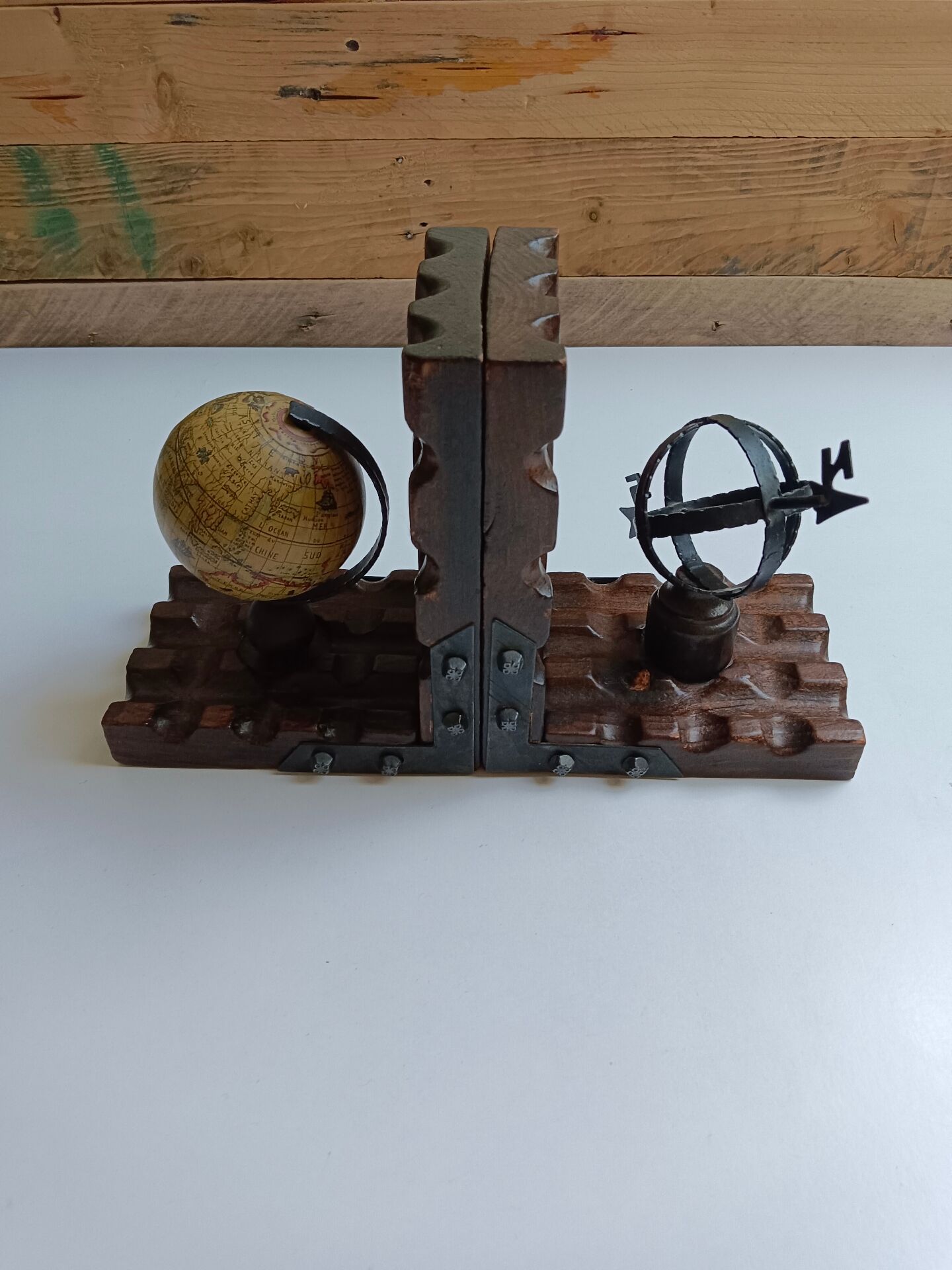 Wooden bookends globe world map