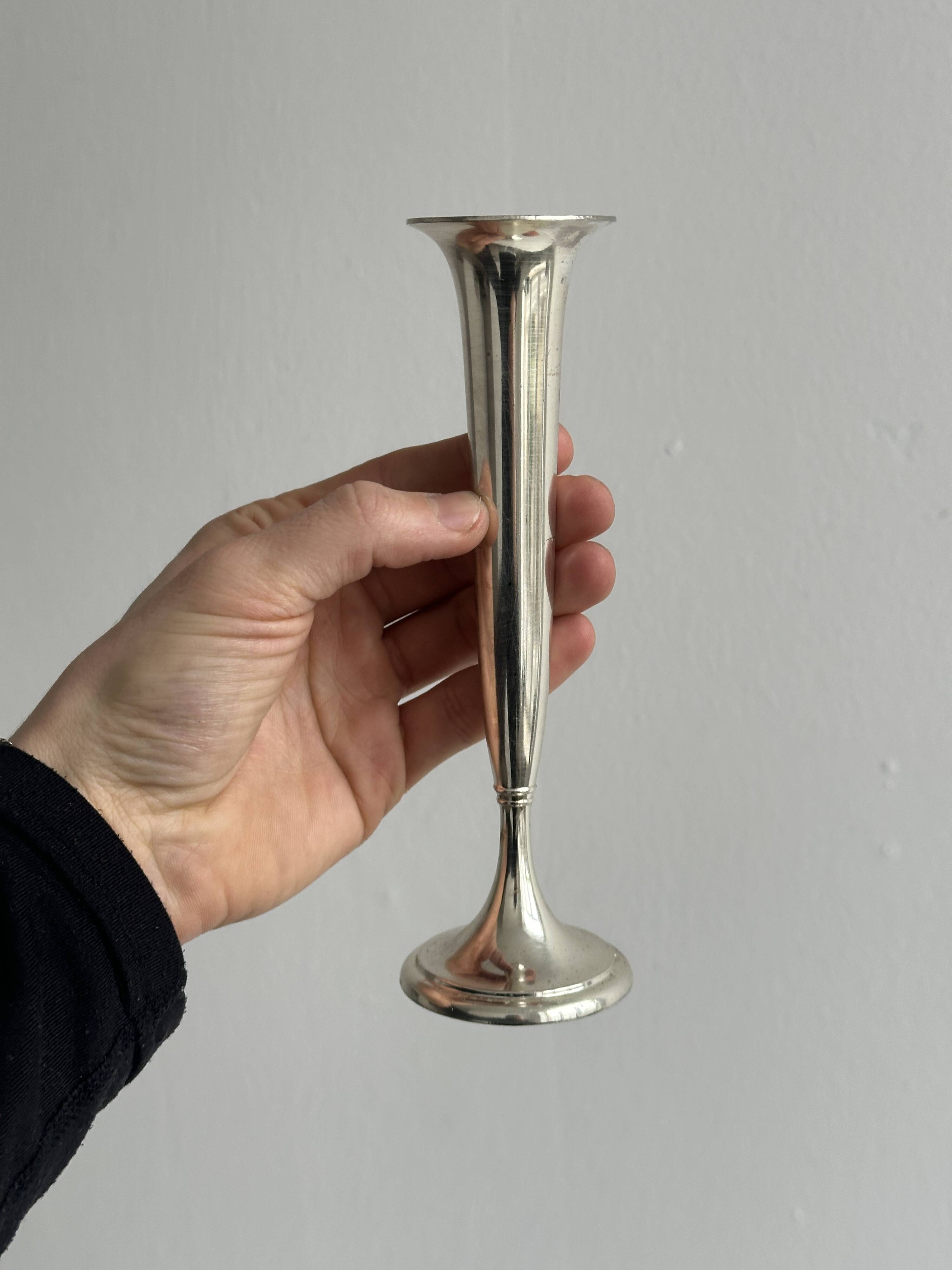 Small shiny metal bud vase