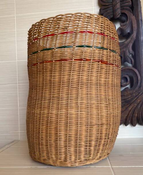 High basket with woven straws