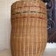 High basket with woven straws