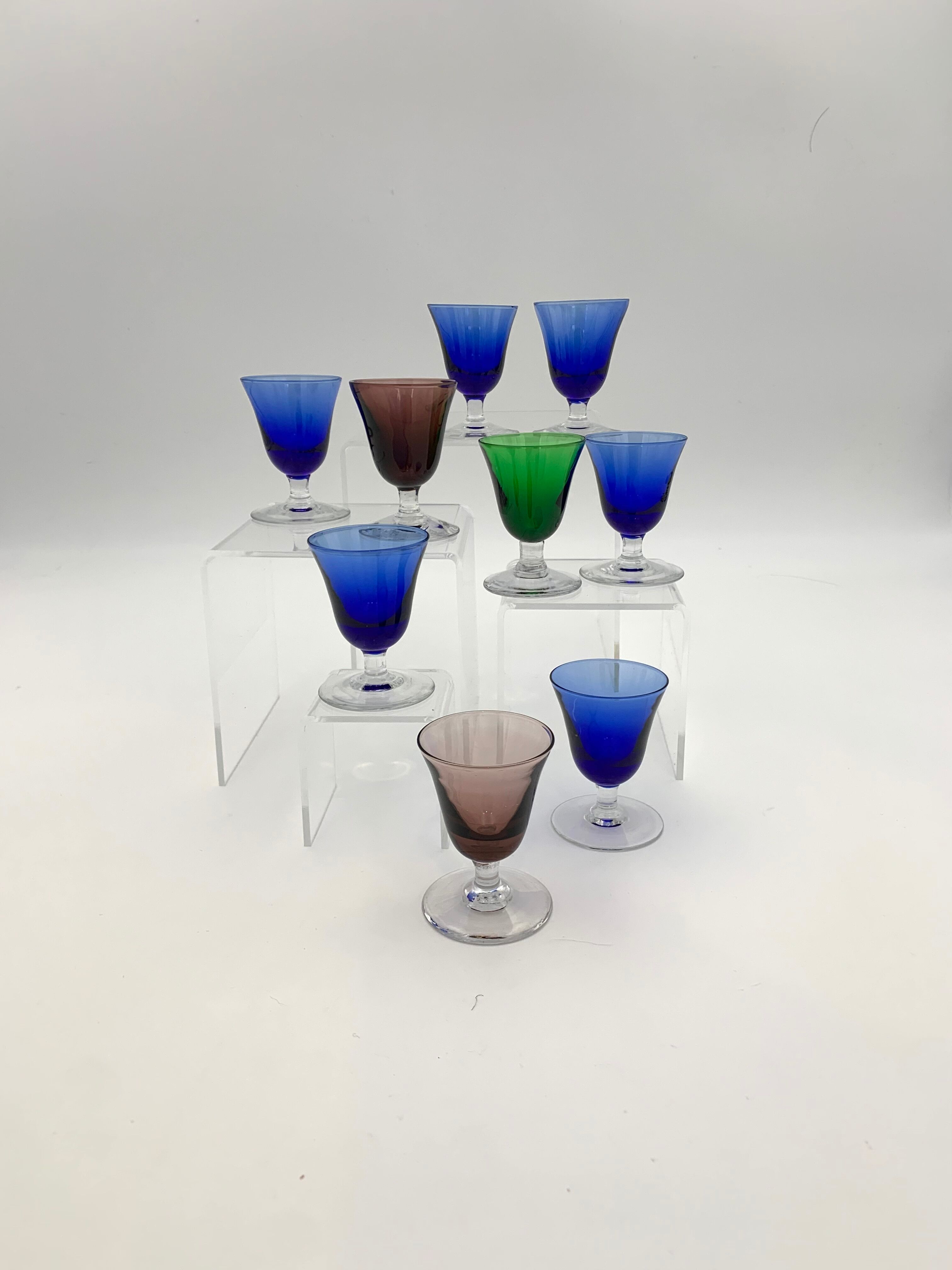 Nine vintage liquor glasses, coloured glass 20th century