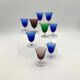 Nine vintage liquor glasses, coloured glass 20th century