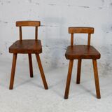 Pair of tripod stools with brutalist backrests, France, circa 1960