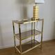 VINTAGE SHELF CONSOLE IN GOLD METAL AND SMOKED GLASS