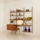 Danish teak wall unit in the style of Cadovius, Sorensen with a lamp, 1970s