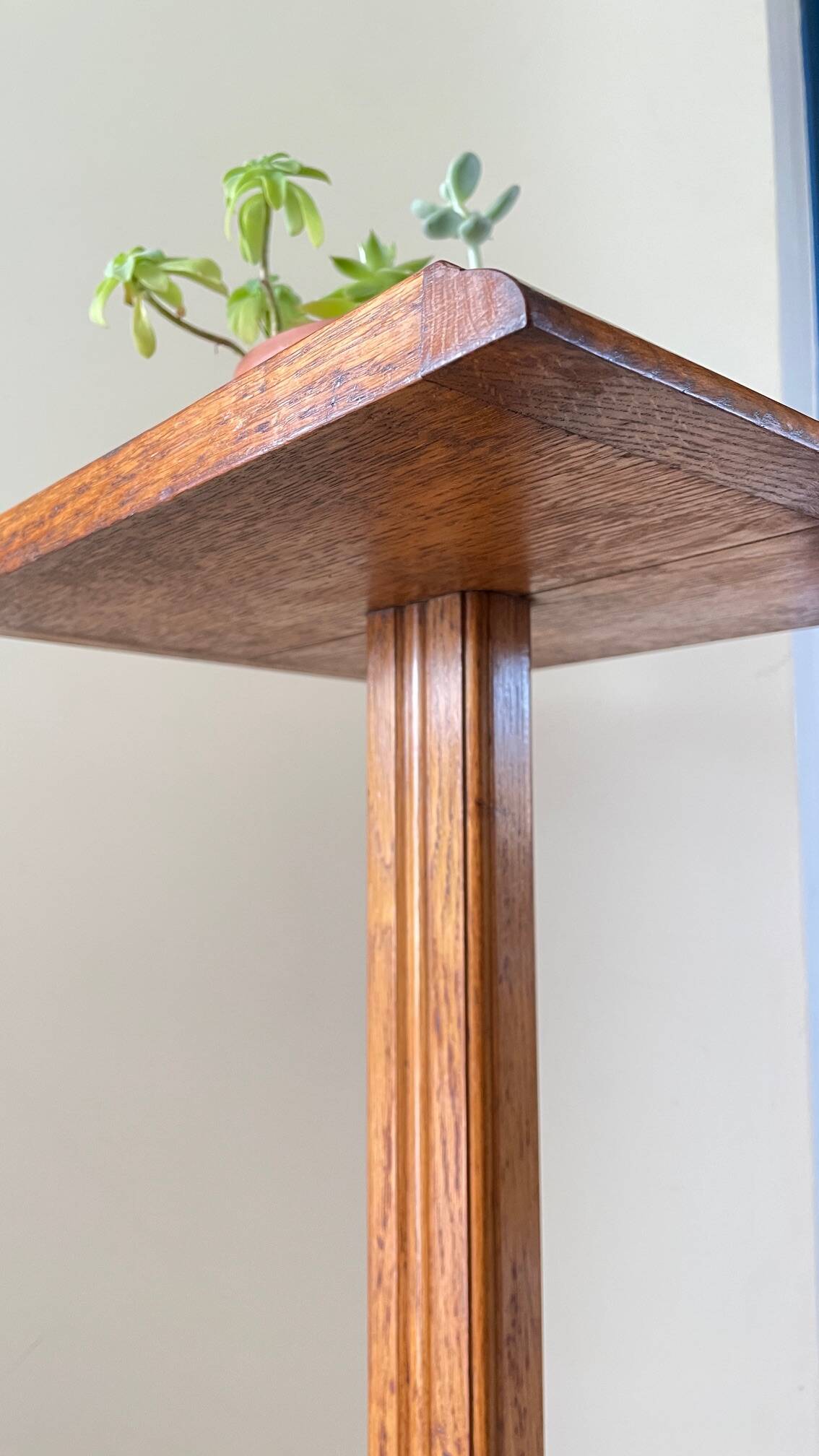 Vintage solid oak saddle plant holder