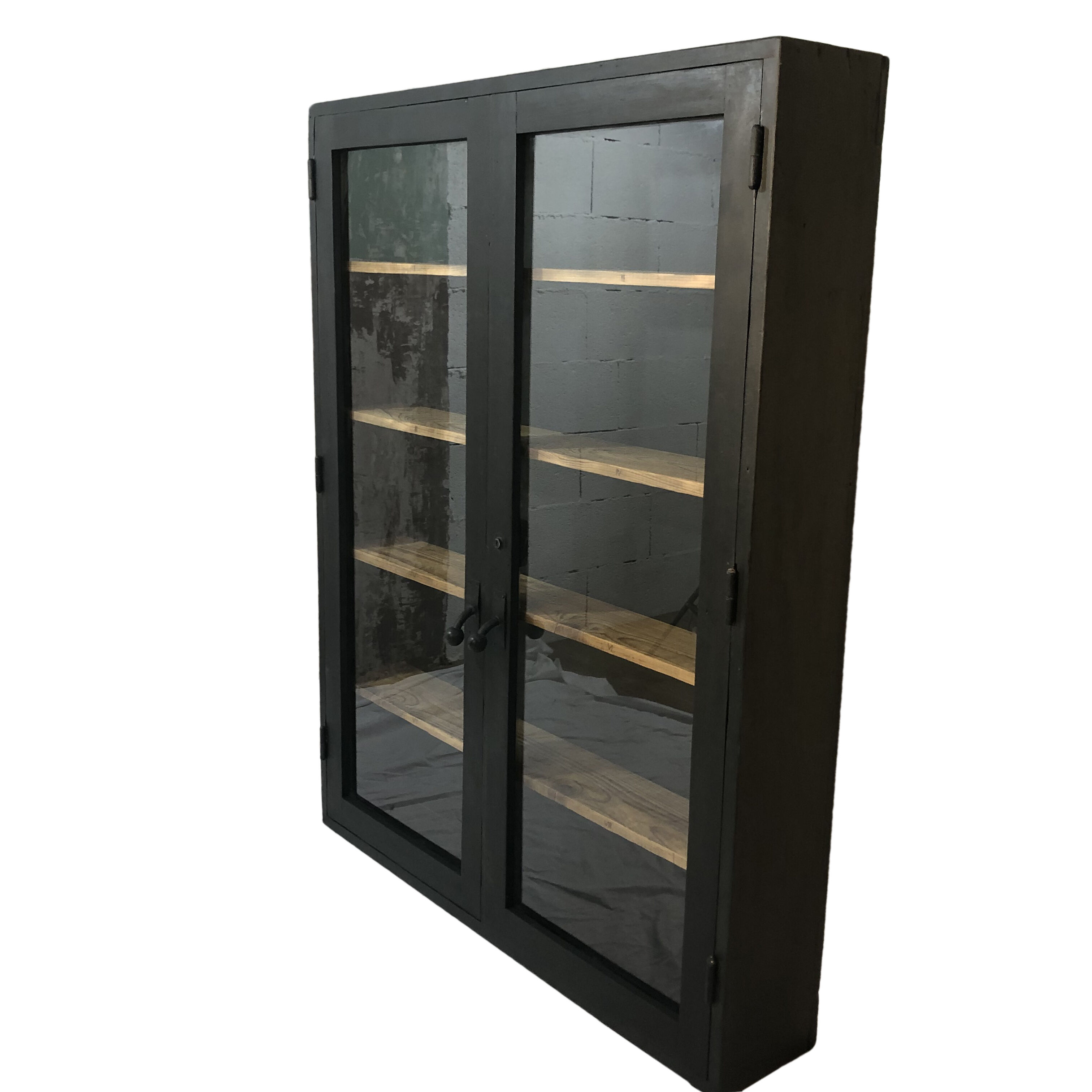 Former black painted wood workshop showcase