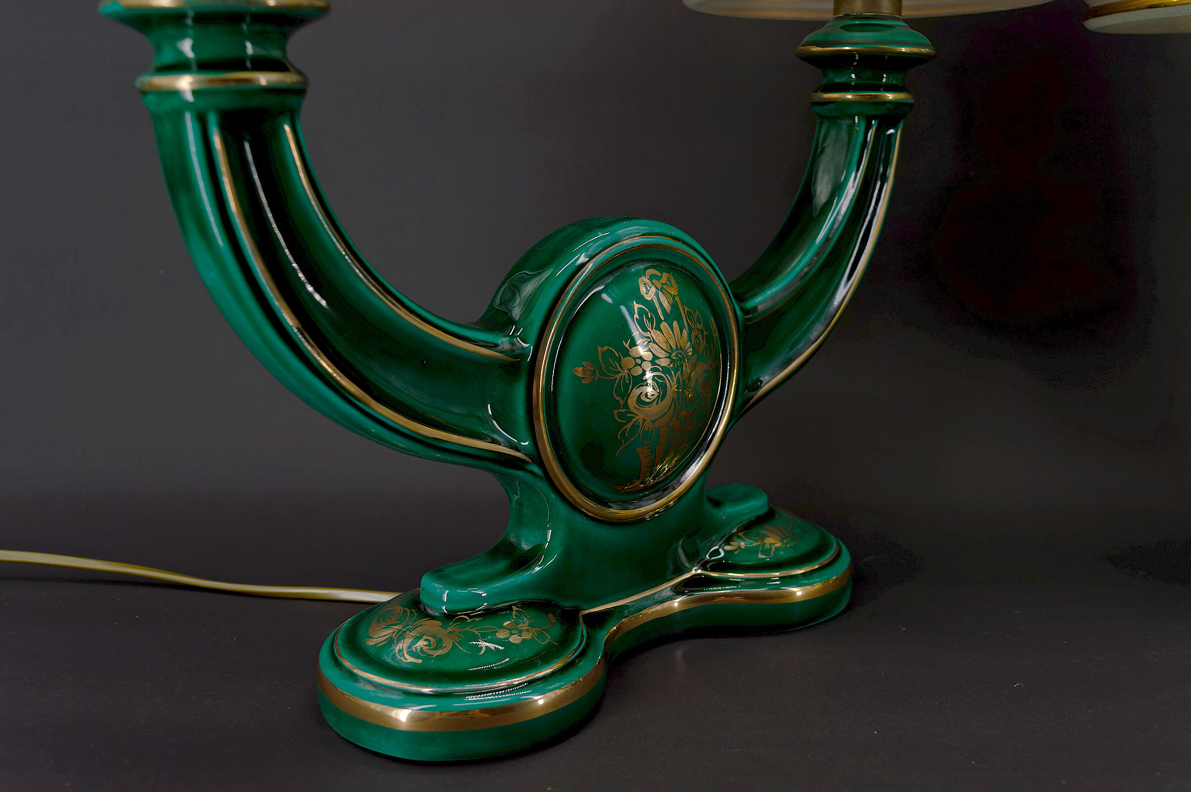 Pair of lamps in green and gold earthenware, circa 1940