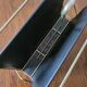 Vintage metal magazine rack in gold and black vinyl Newspaper holder