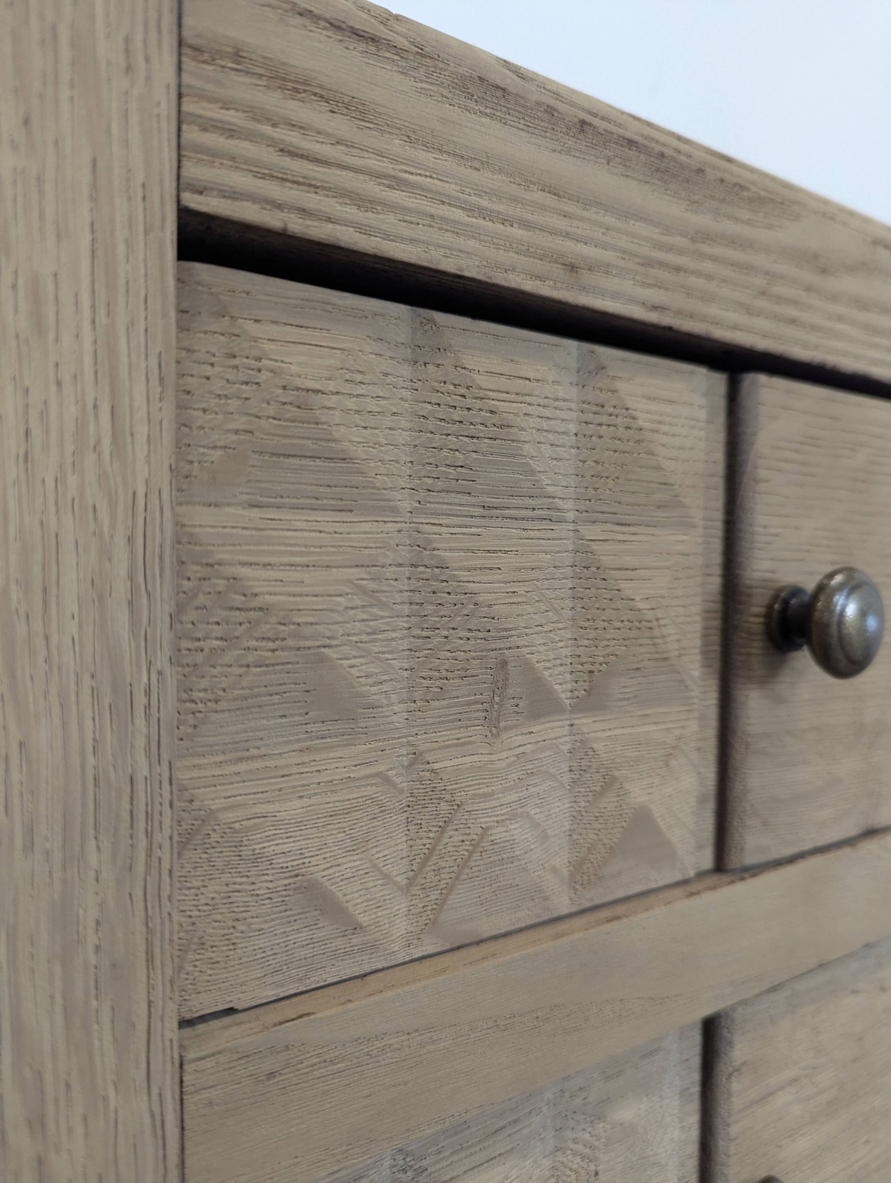 Brutalist commode with stripped diamond tips.