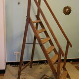 Old wooden stepladder with bodyguards