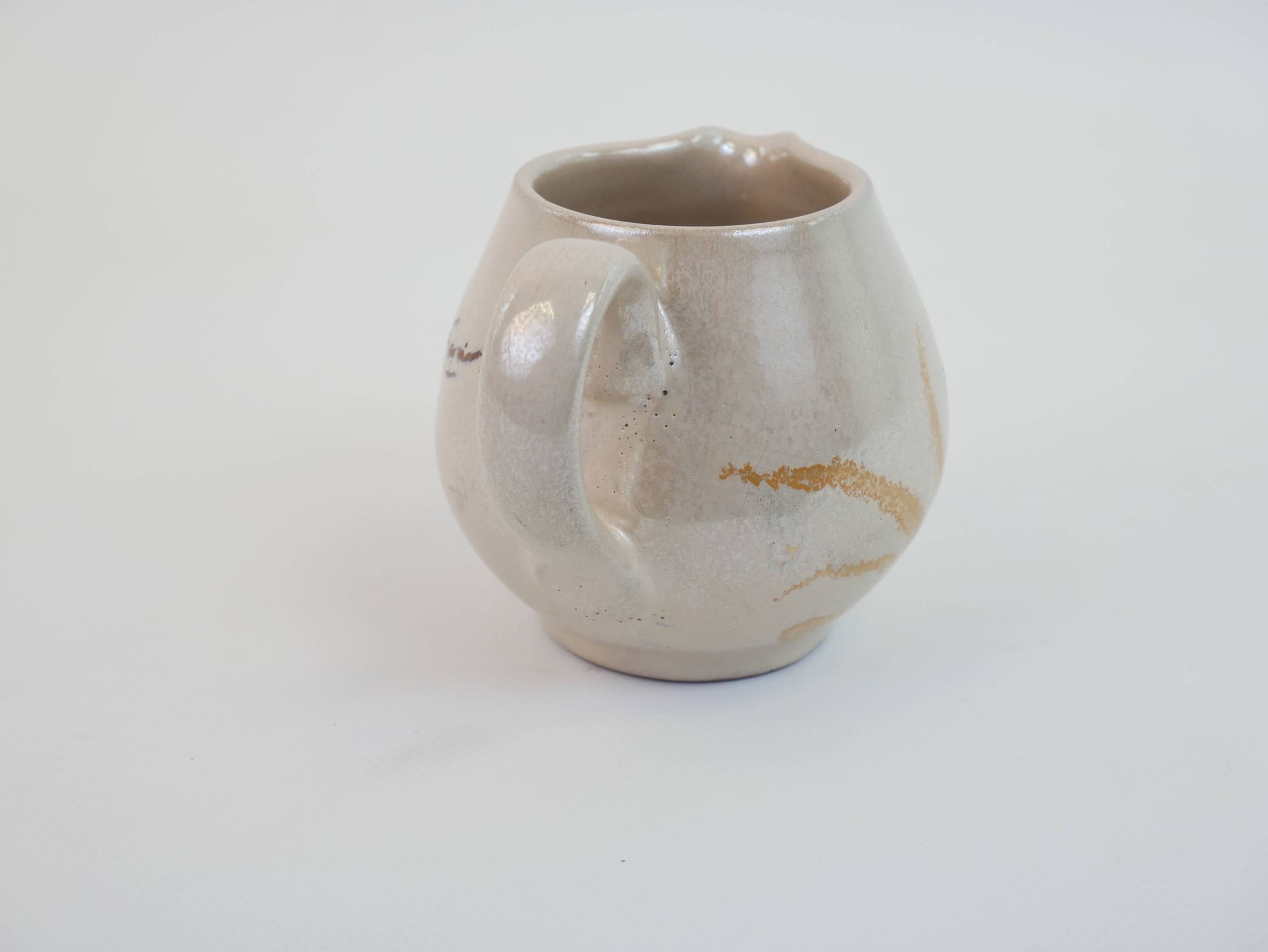 Pair of ceramic milk jugs signed La Roue Vallauris