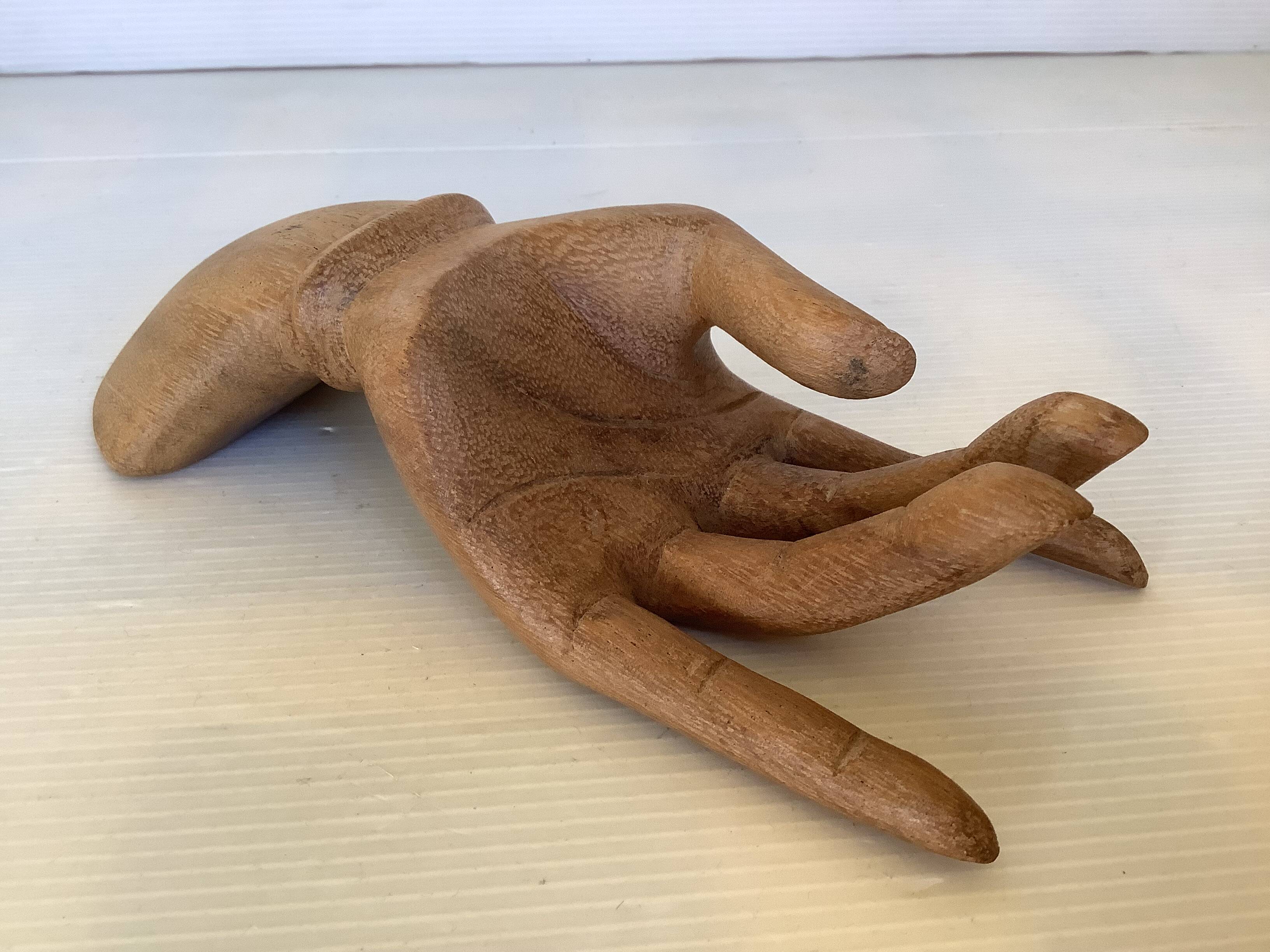 Wooden hand ring sizer pocket emptier