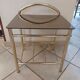 Brass and smoked glass table